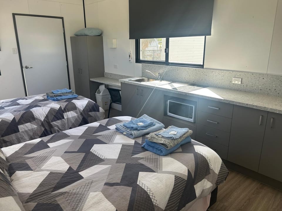 Bed, Kitchen or kitchenette, Bedroom, towels