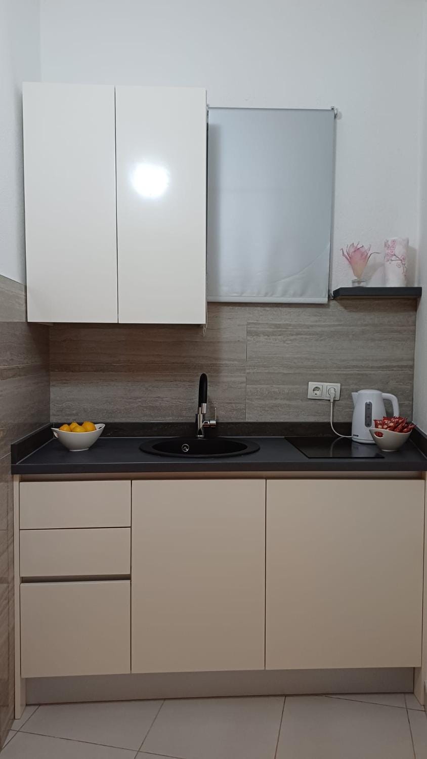 Kitchen or kitchenette, stove, kitchen, kitchen