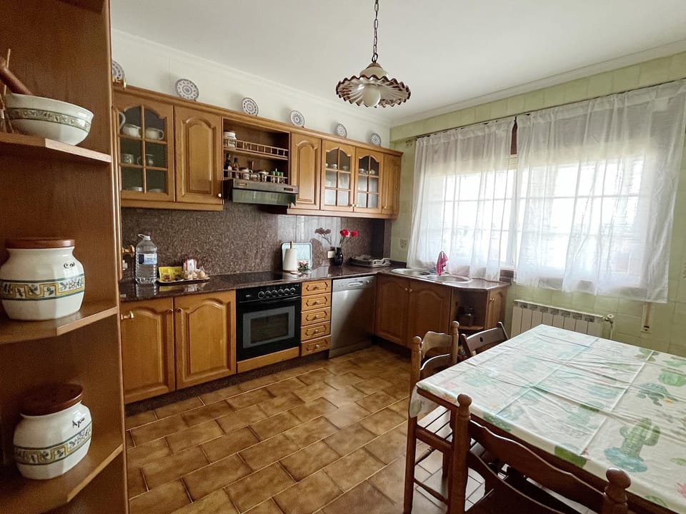 Kitchen or kitchenette, dishwasher, oven, stove