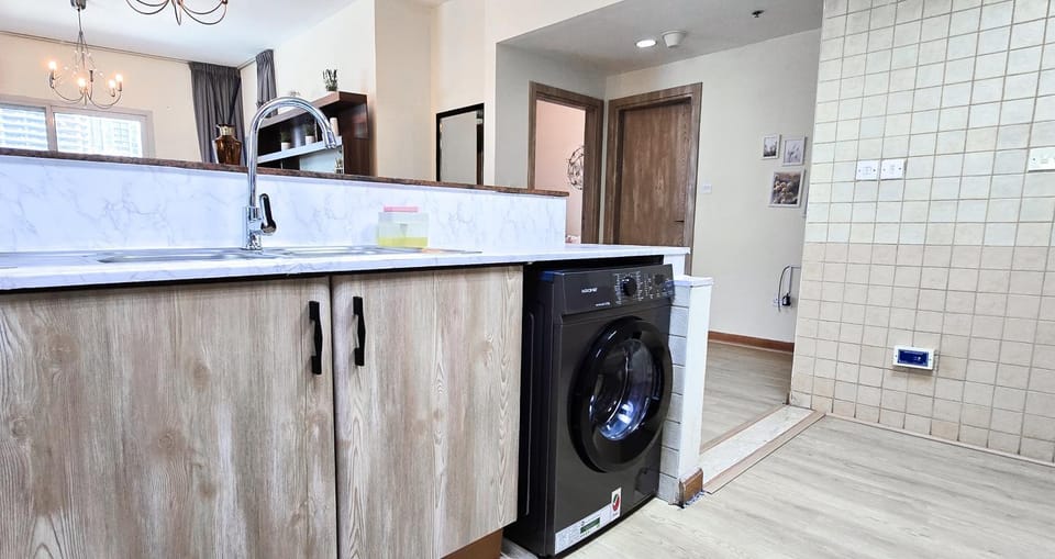 Kitchen or kitchenette, washing machine