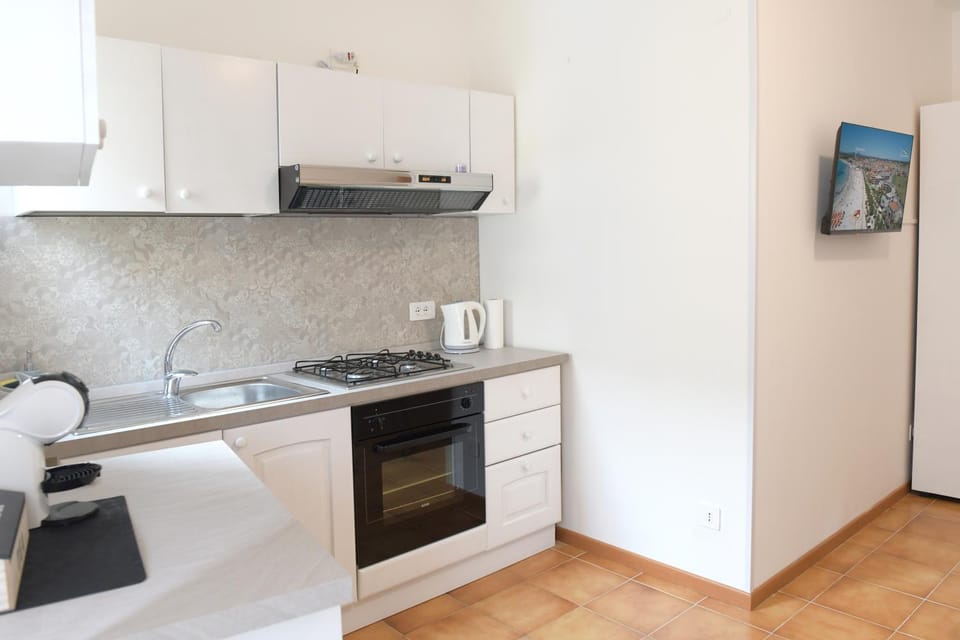 Kitchen or kitchenette, stove