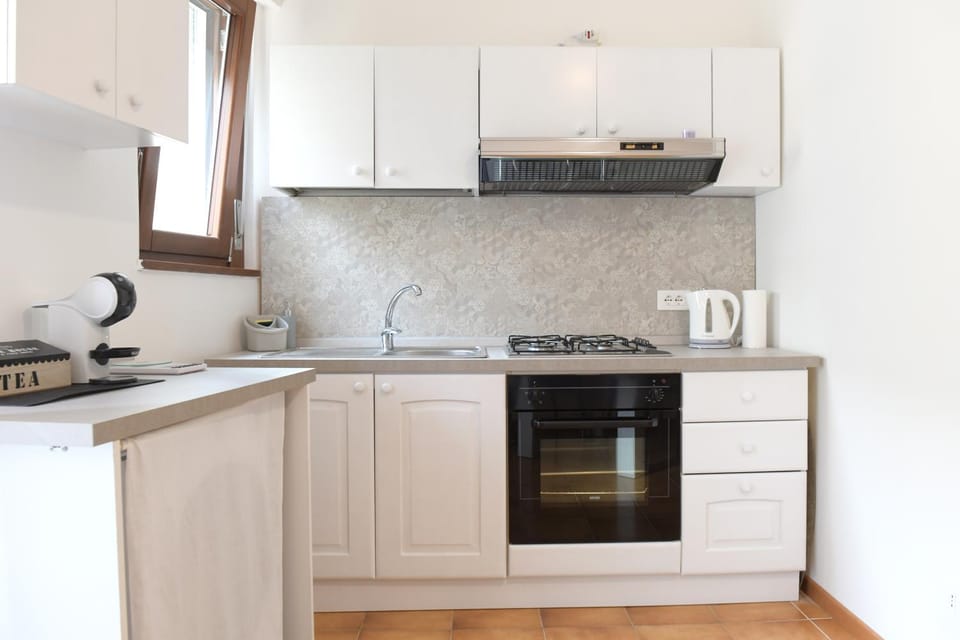 Kitchen or kitchenette, stove