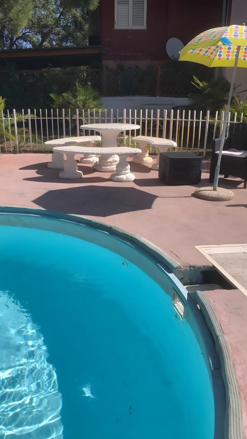 Property building, Living room, Swimming pool