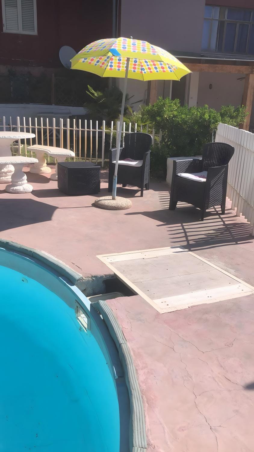 Property building, Living room, Swimming pool