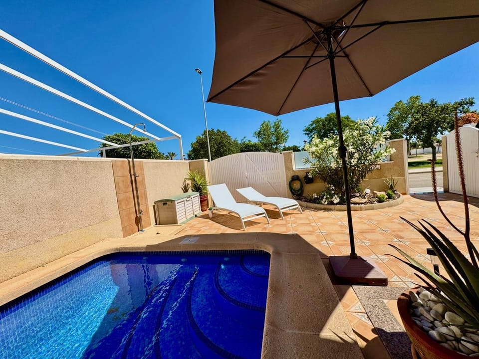 Patio, Pool view, Swimming pool, sunbed