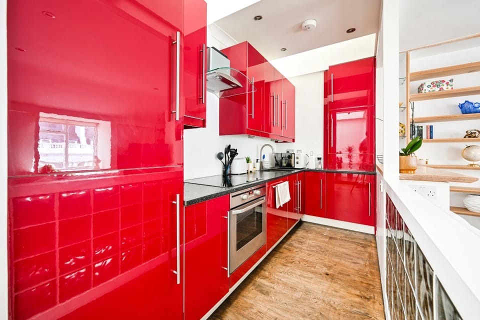 Kitchen or kitchenette, dishwasher, oven, stove