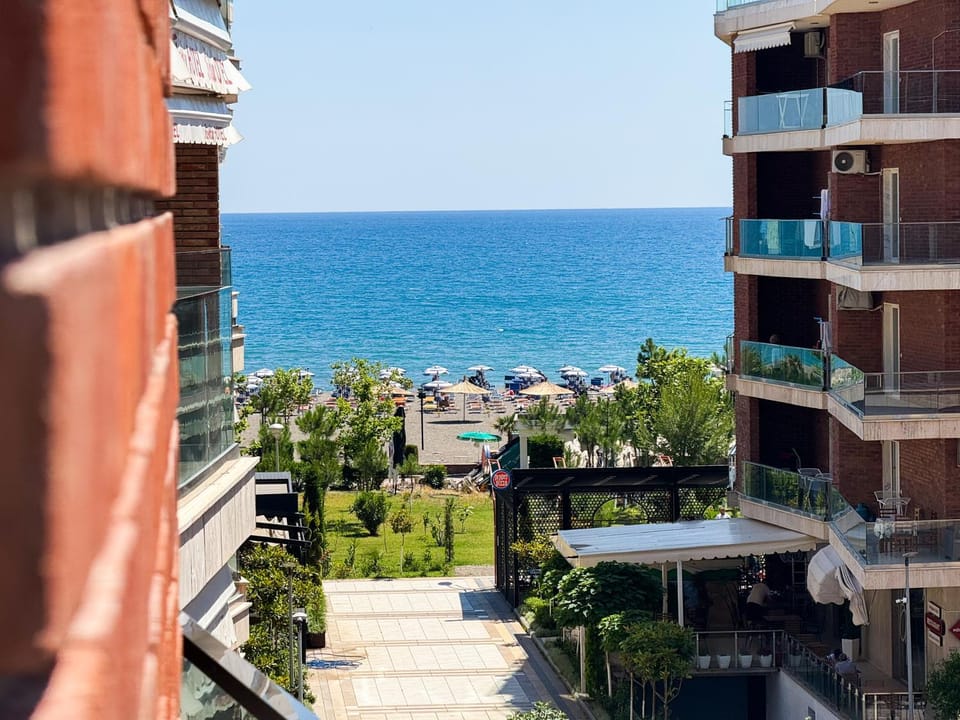 Property building, Day, Natural landscape, View (from property/room), Balcony/Terrace, Beach, Evening entertainment, Sea view