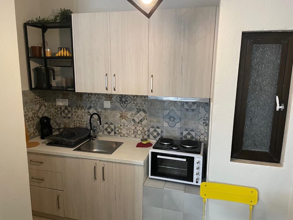 Kitchen or kitchenette, toaster