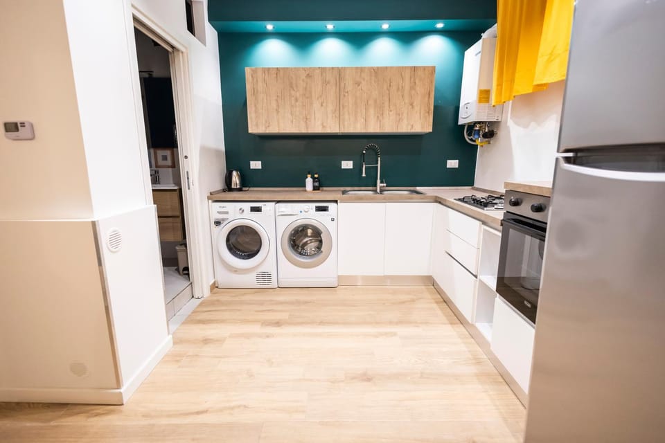 Kitchen or kitchenette, dishwasher, stove, dryer