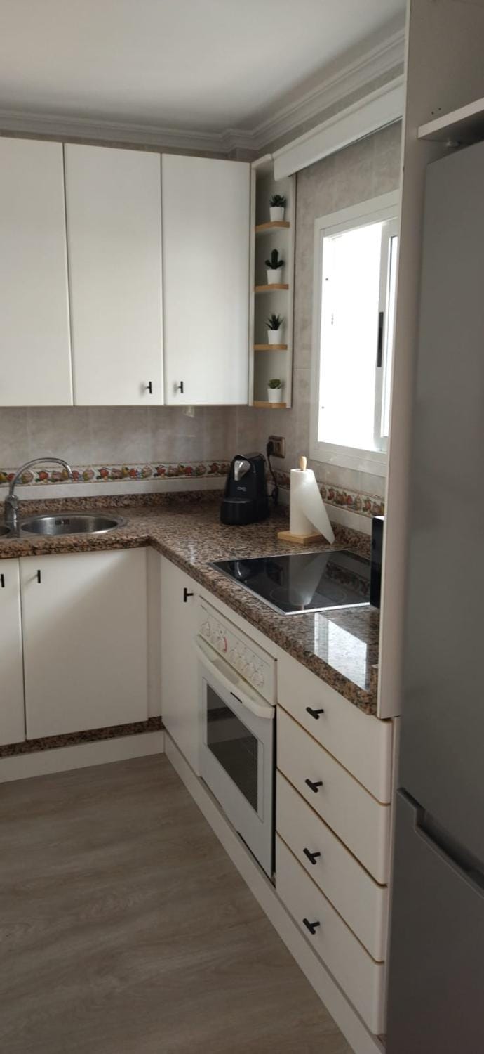 Kitchen or kitchenette, stove