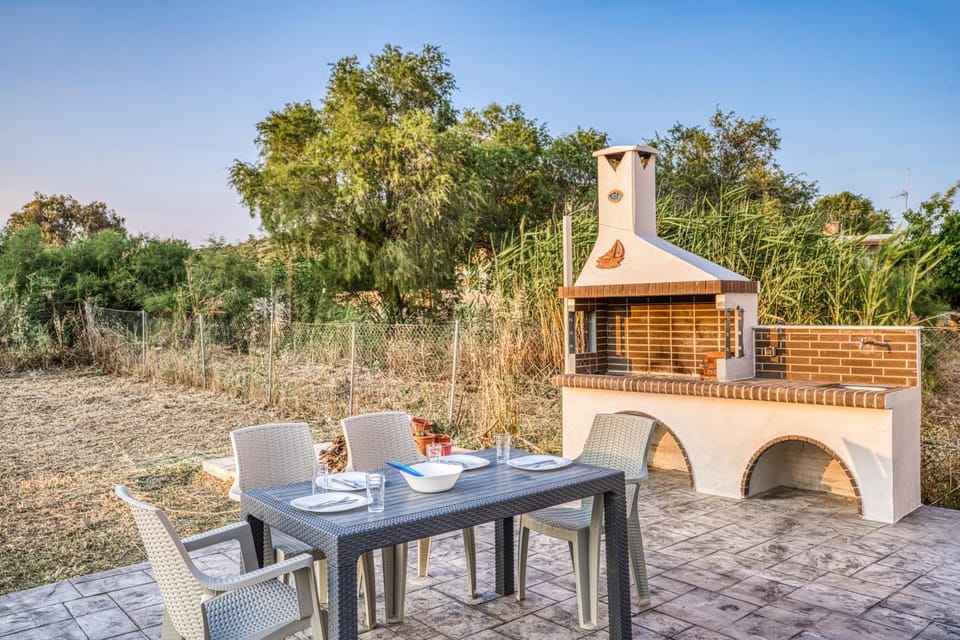 Patio, Day, BBQ facilities, Dining area