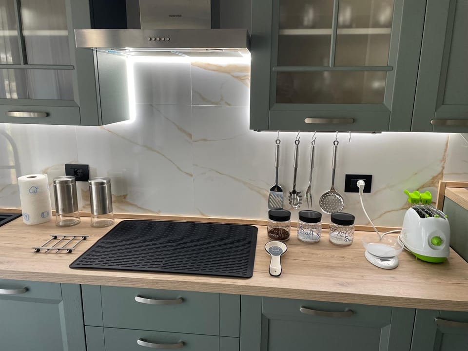 Kitchen or kitchenette, stove, toaster