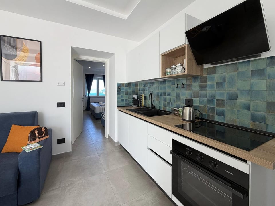 Kitchen or kitchenette, Living room, stove
