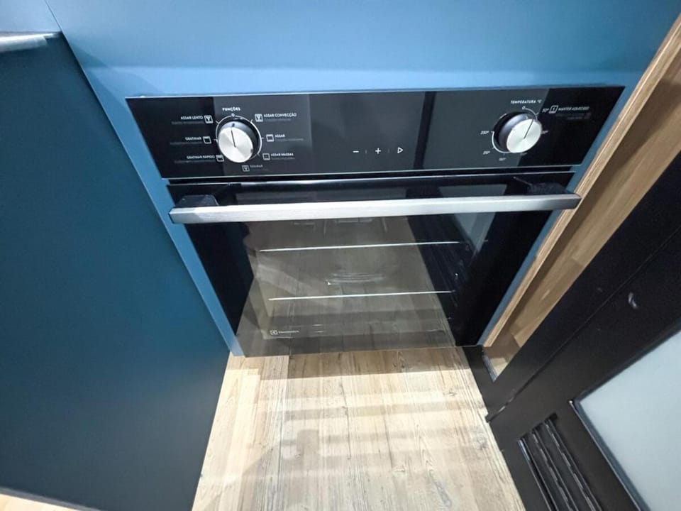Kitchen or kitchenette, oven