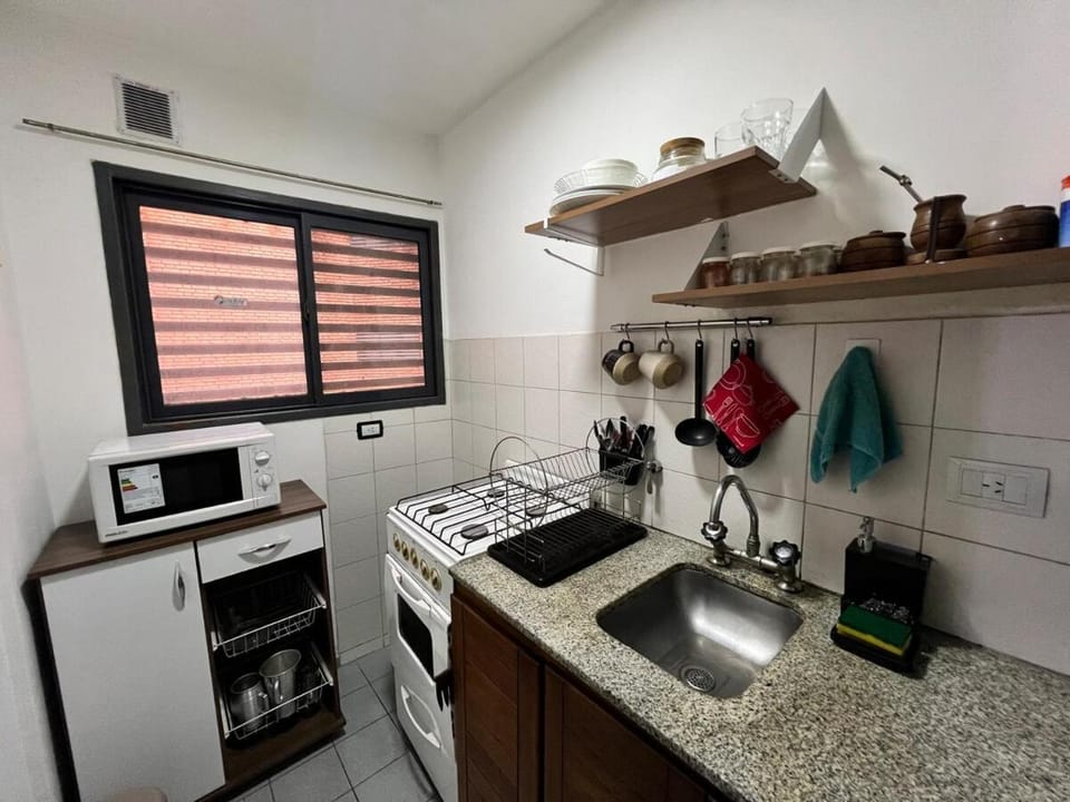 Kitchen or kitchenette, microwave, oven