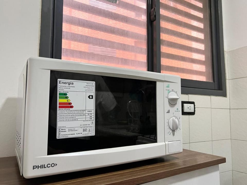 Kitchen or kitchenette, microwave