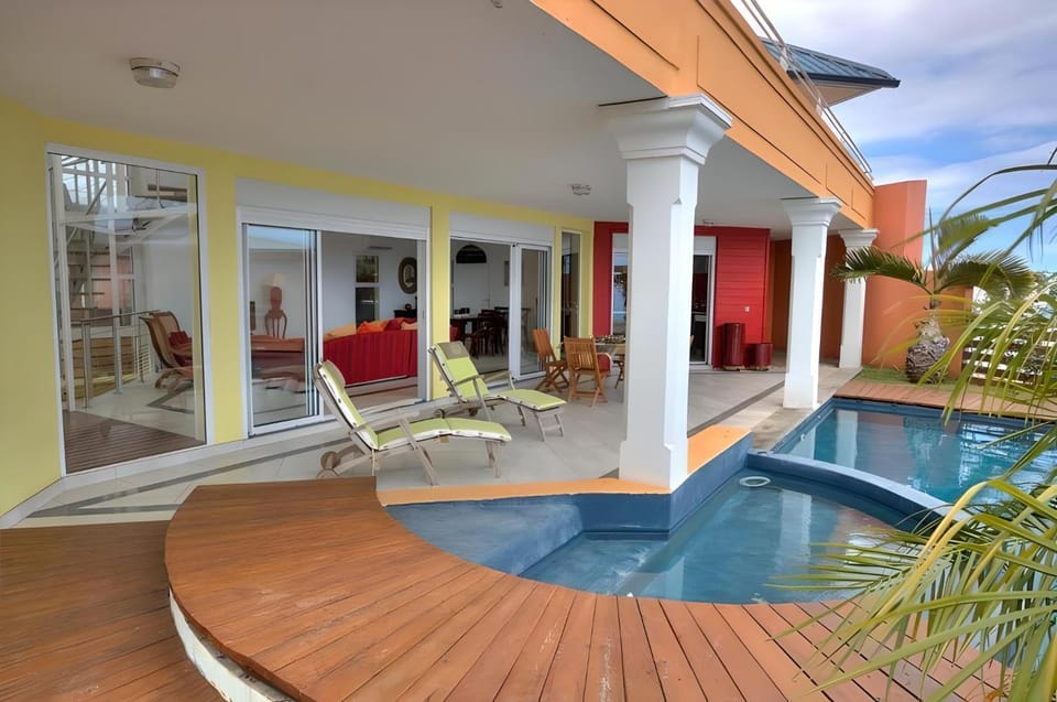 Property building, Patio, Swimming pool, sunbed