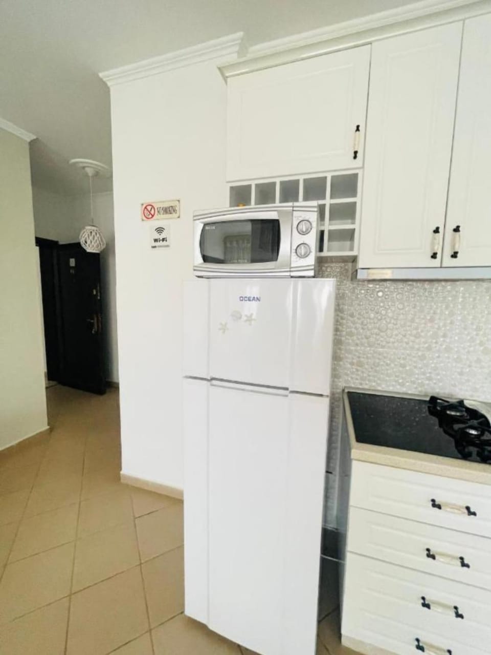 Kitchen or kitchenette, oven