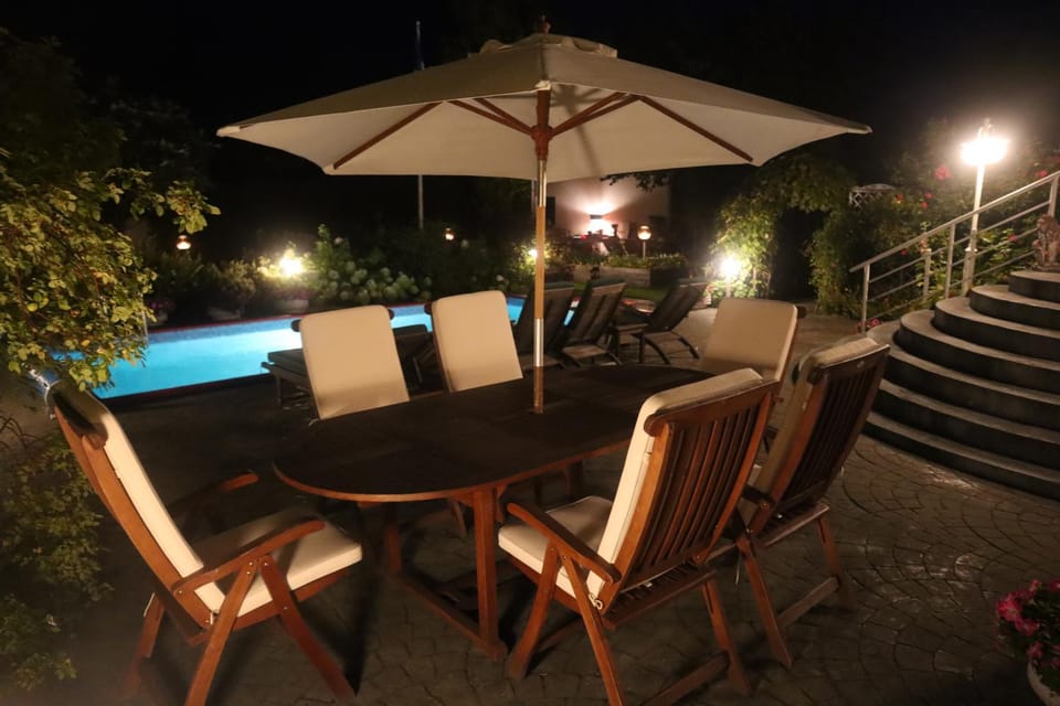 Night, Seating area, Pool view