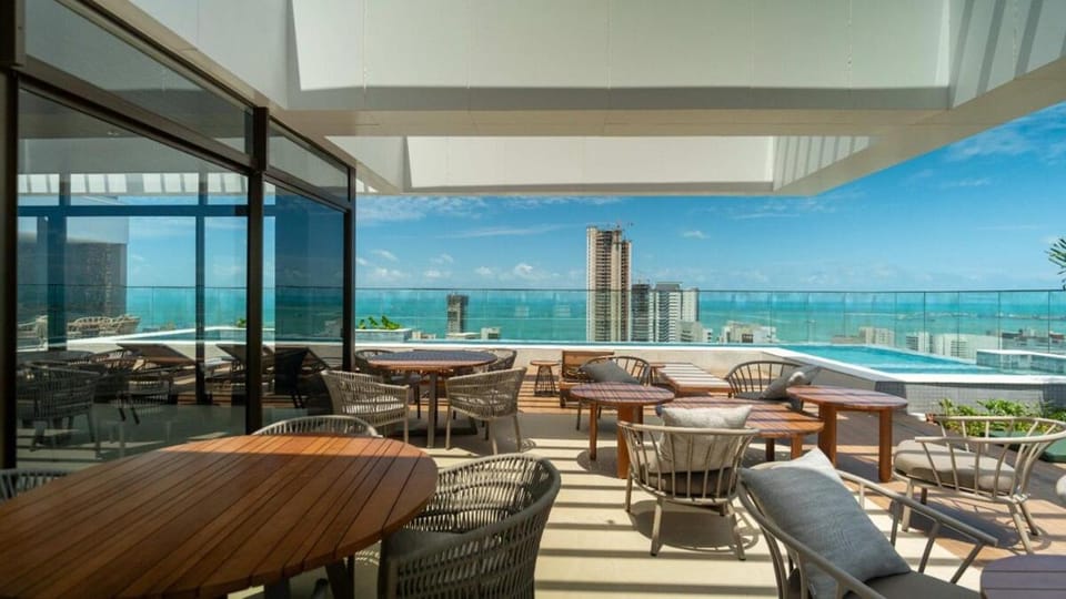 Balcony/Terrace, Seating area, City view, Pool view, Sea view