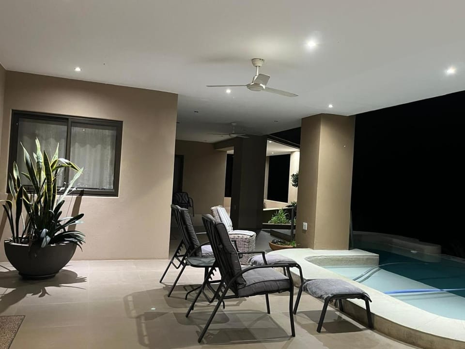 Seating area, Pool view, Swimming pool, sunbed