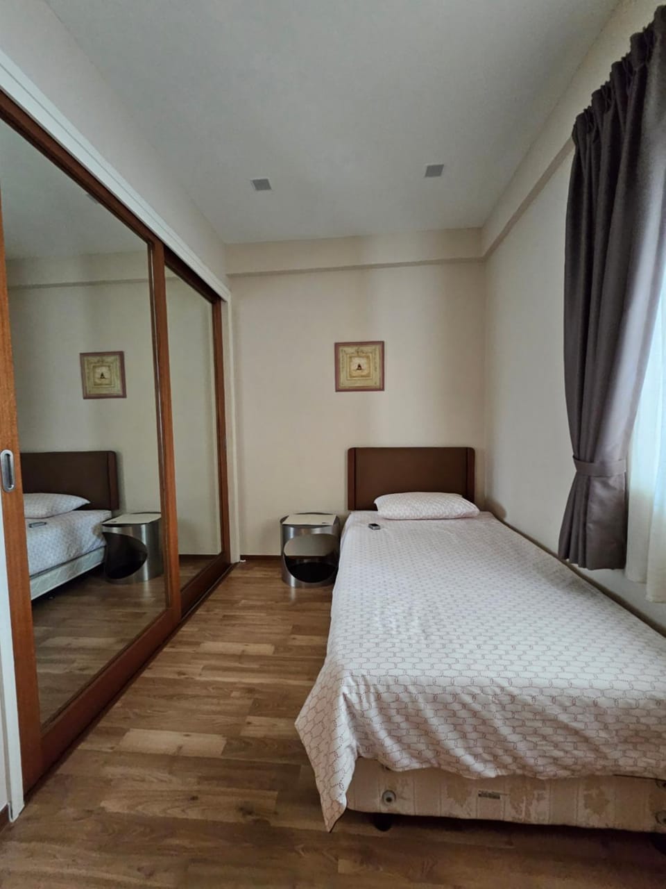 Bed, Bedroom, hair dryier, towels, air conditioner