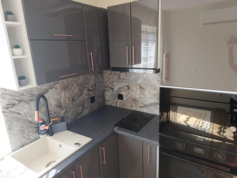Kitchen or kitchenette, stove