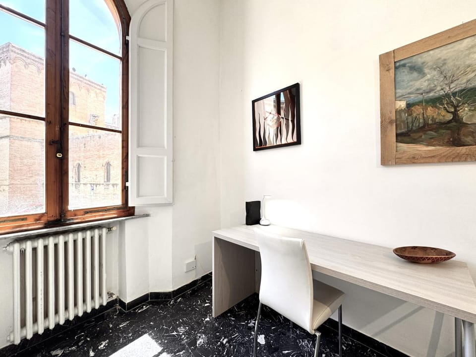 Abbadia Panoramic Terrace Apartment in Siena