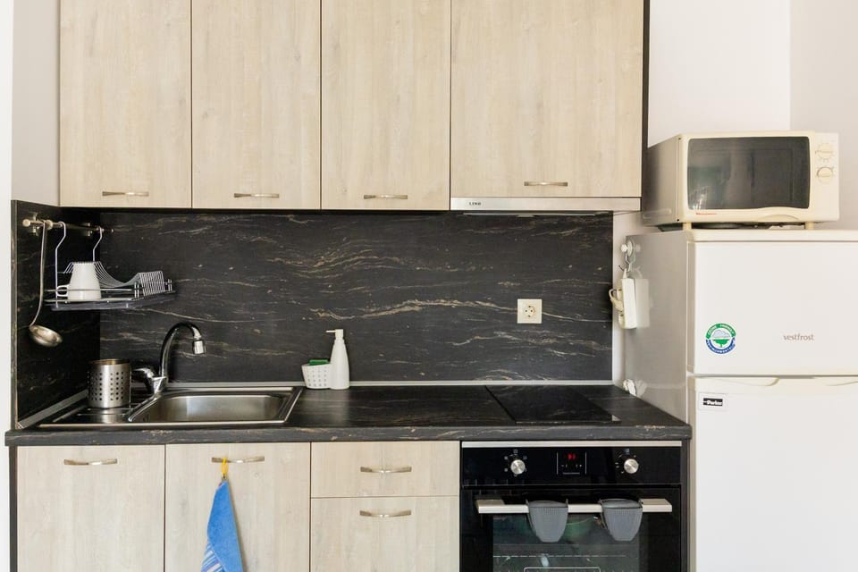 Kitchen or kitchenette, stove