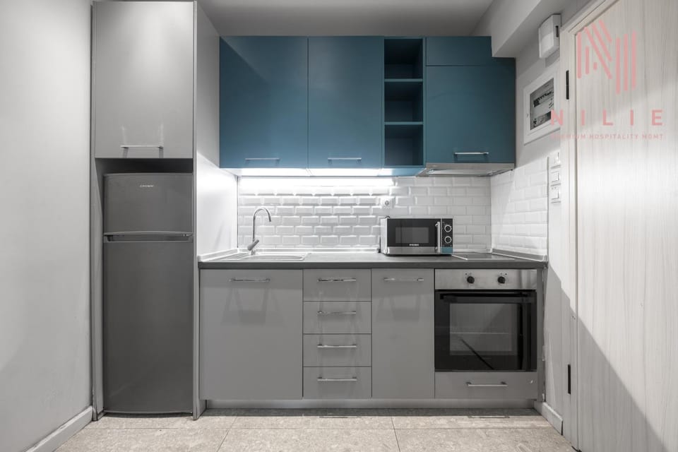 Kitchen or kitchenette, oven, stove