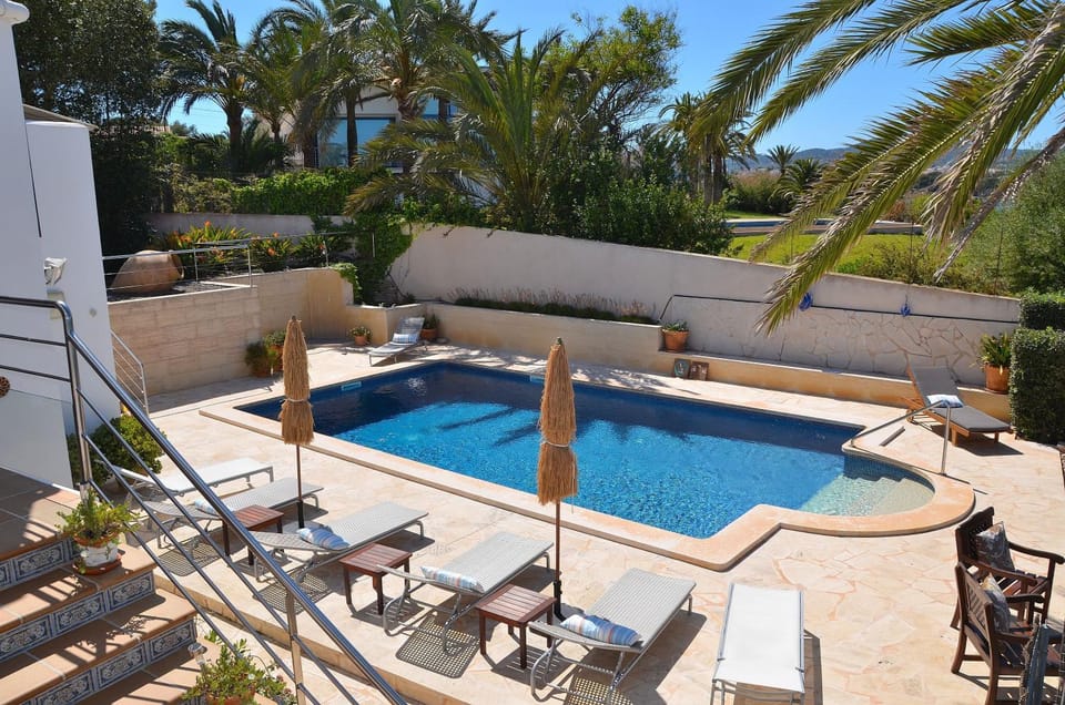 Property building, Living room, Swimming pool