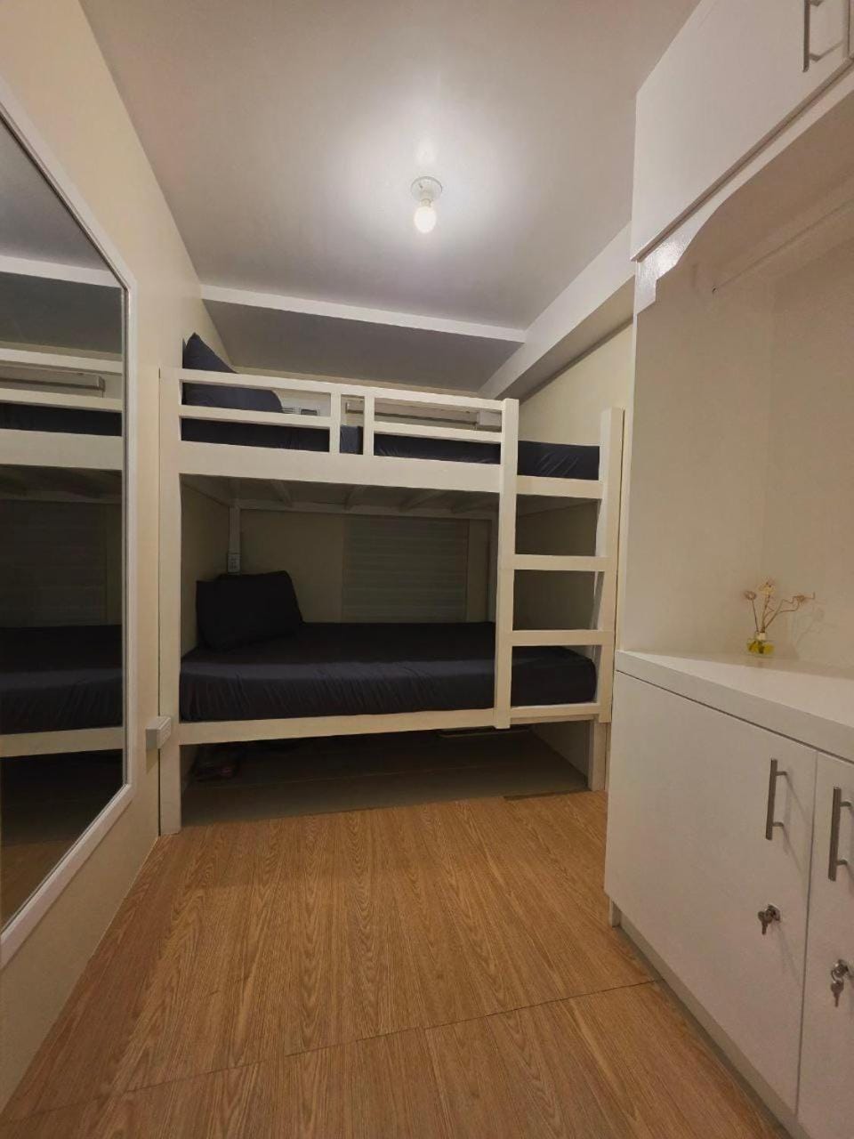 Bed, bunk bed, hair dryier, wardrobe, air conditioner