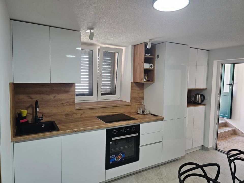 Betina apartments with parking space near the beach Apartment in Murter