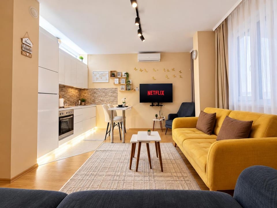 Kitchen or kitchenette, Living room, Seating area, Dining area