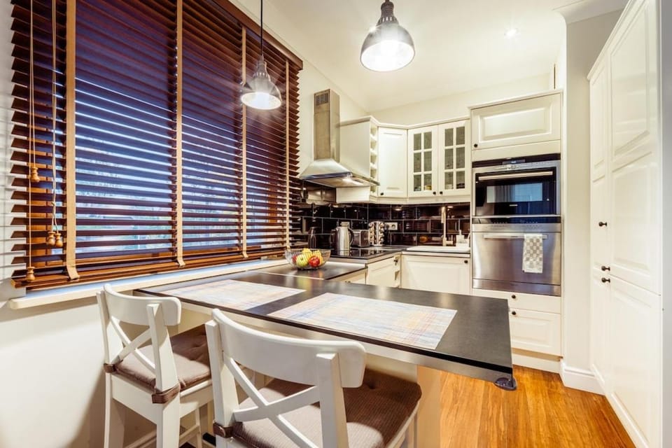 Kitchen or kitchenette, Dining area, dishwasher, stove, washing machine