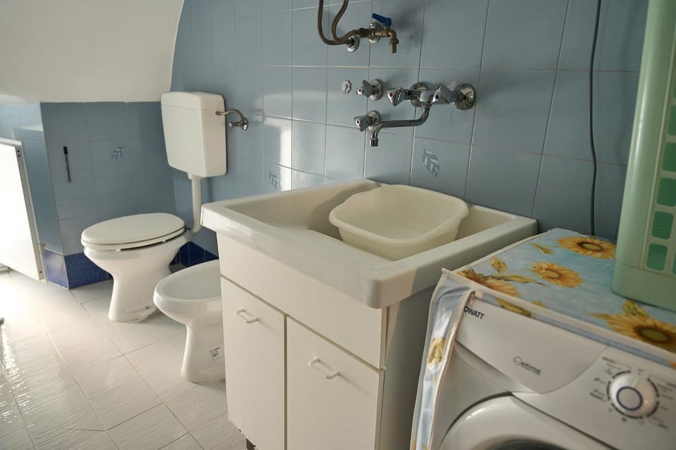 Bathroom, bidet, laundry, washing machine