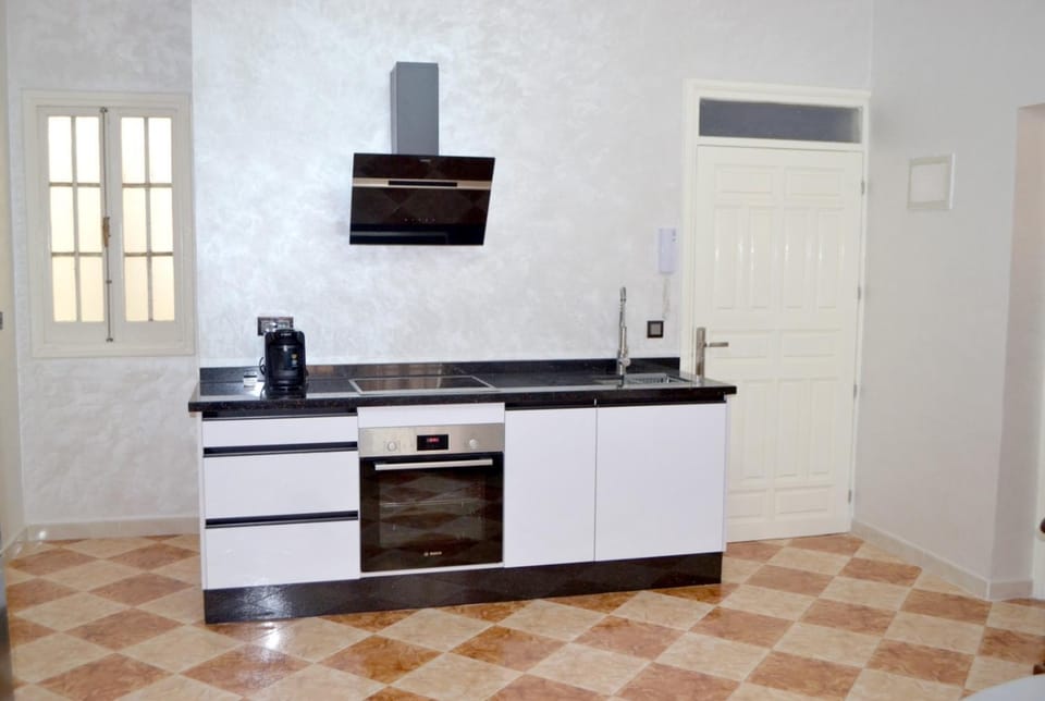 Kitchen or kitchenette, oven, stove
