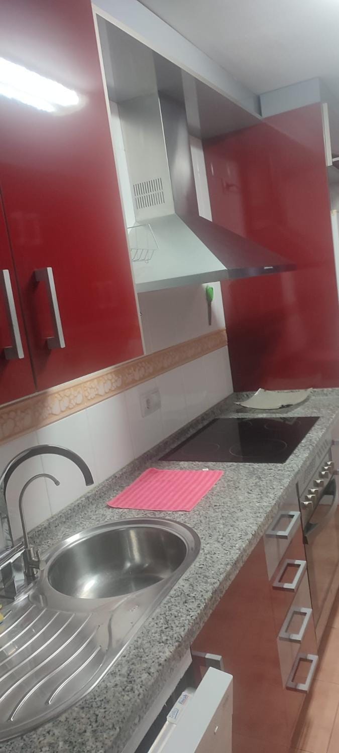 Kitchen or kitchenette, stove
