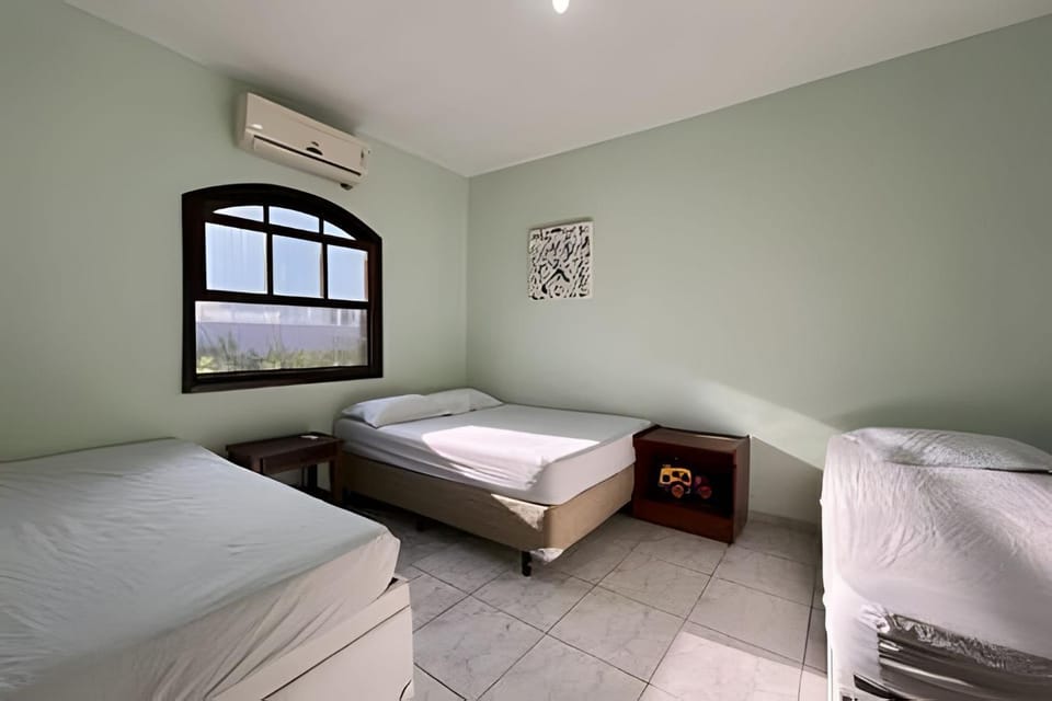 Casa de praia em Condomínio, Ar e Piscina c/ Hidro House in Bertioga