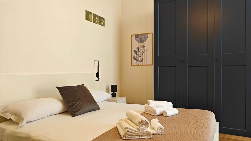 Bed, Photo of the whole room, Bedroom, towels, wardrobe