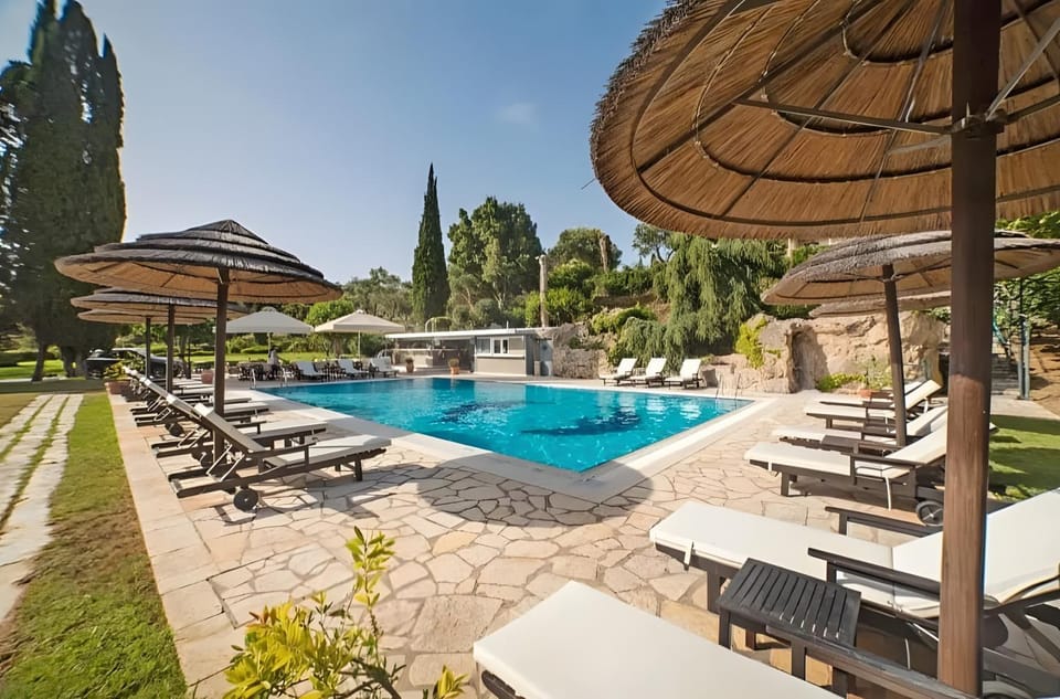 Property building, Living room, Swimming pool