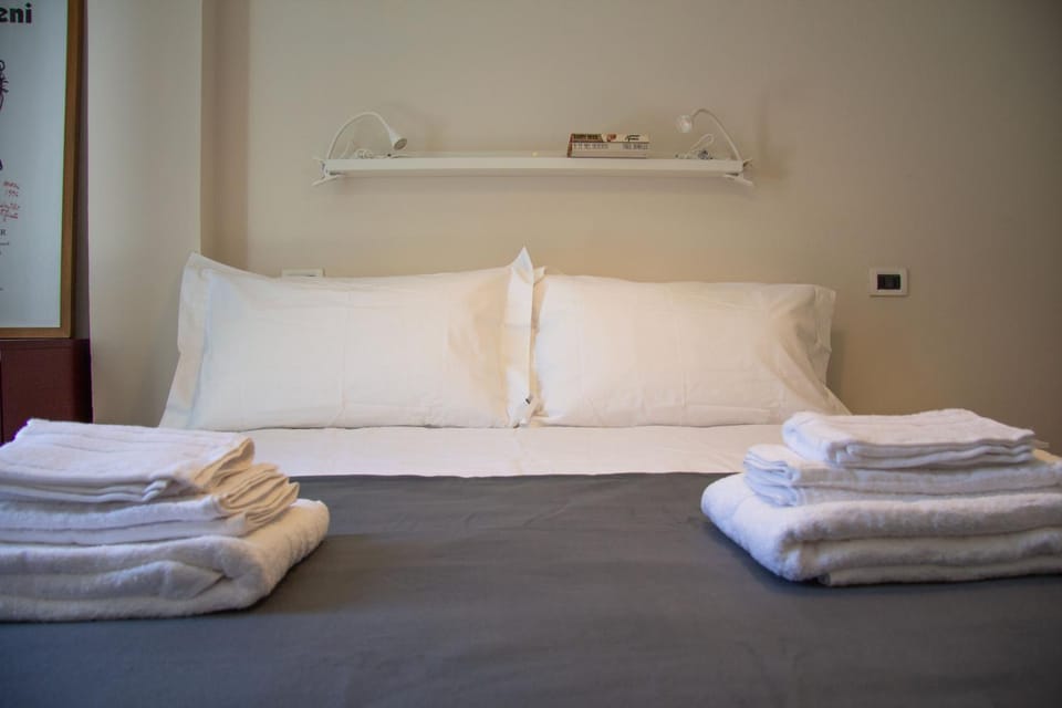 Nearby landmark, Bed, Day, Library, Library, TV and multimedia, Decorative detail, Decorative detail, Bedroom, Landmark view, Landmark view, Time of day, furniture, furniture, hair dryier, heating, heating, internet, internet, towels, towels, wardrobe, air conditioner, air conditioner