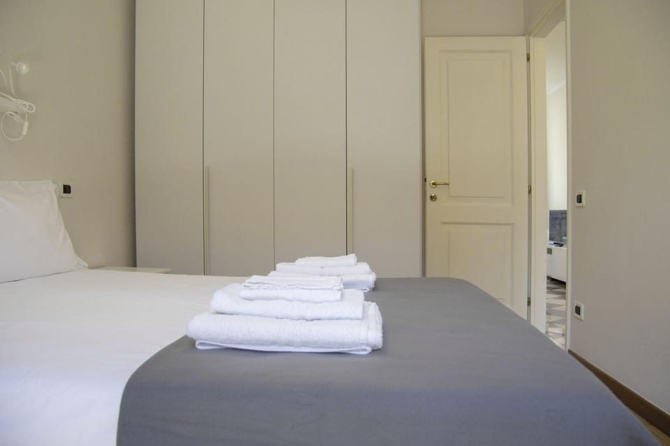 Nearby landmark, Bed, Day, Library, Library, TV and multimedia, Decorative detail, Decorative detail, Bedroom, Landmark view, Landmark view, Time of day, furniture, furniture, hair dryier, heating, heating, internet, internet, towels, towels, wardrobe, air conditioner, air conditioner