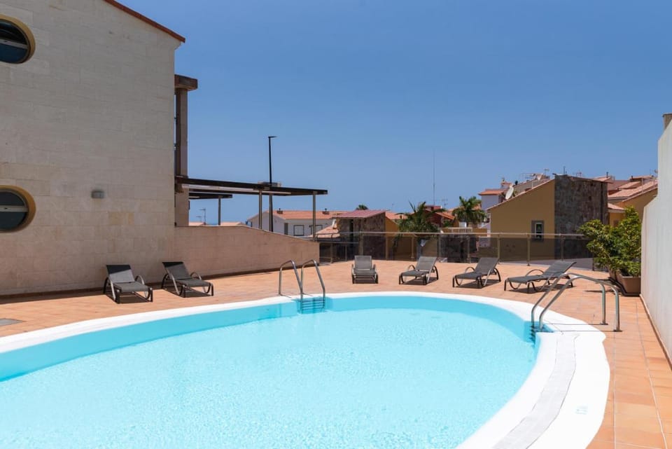 Cozy 2BR Retreat With Big Terrace, Peaceful Stay Minutes Away From the Beach Apartment in Comarca Sur