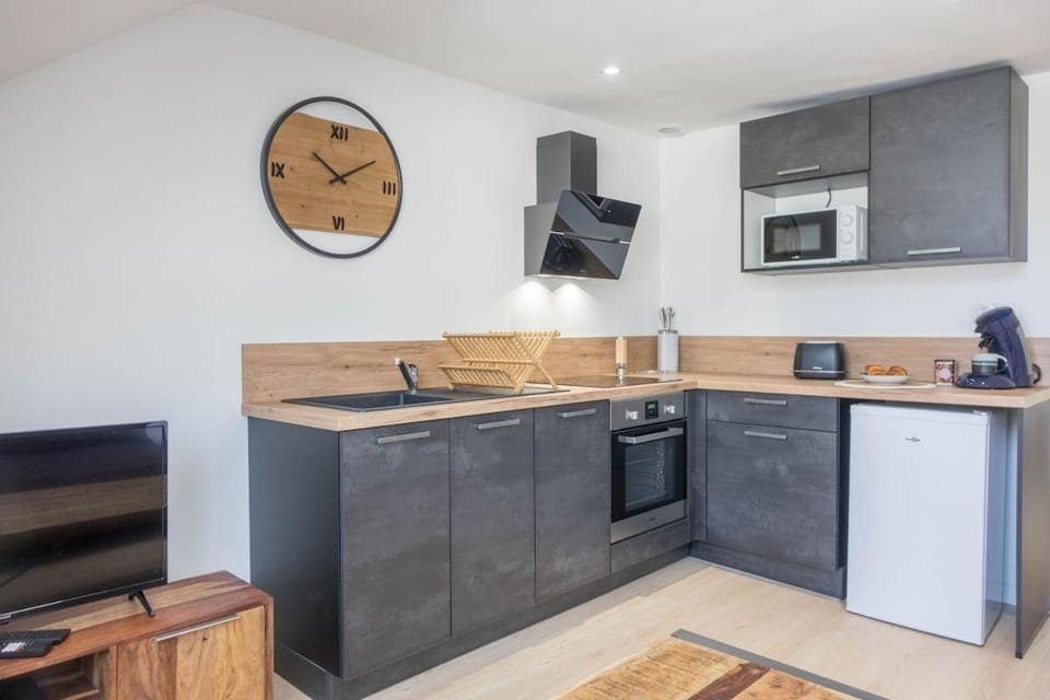 Kitchen or kitchenette, oven, stove, toaster