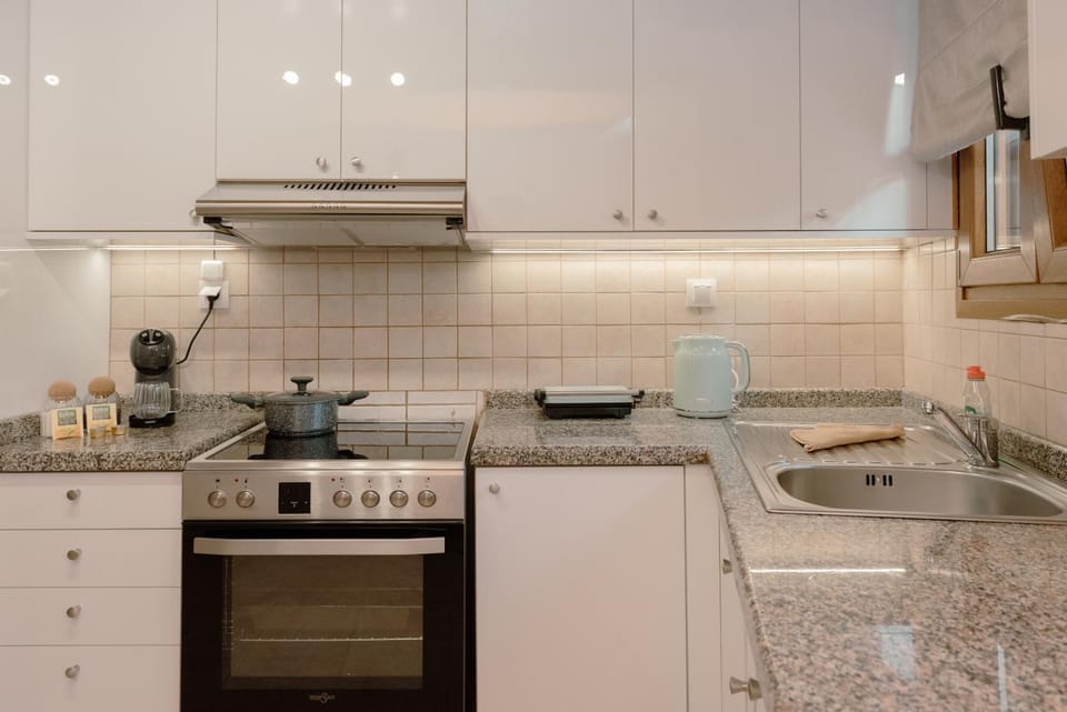 Kitchen or kitchenette, stove