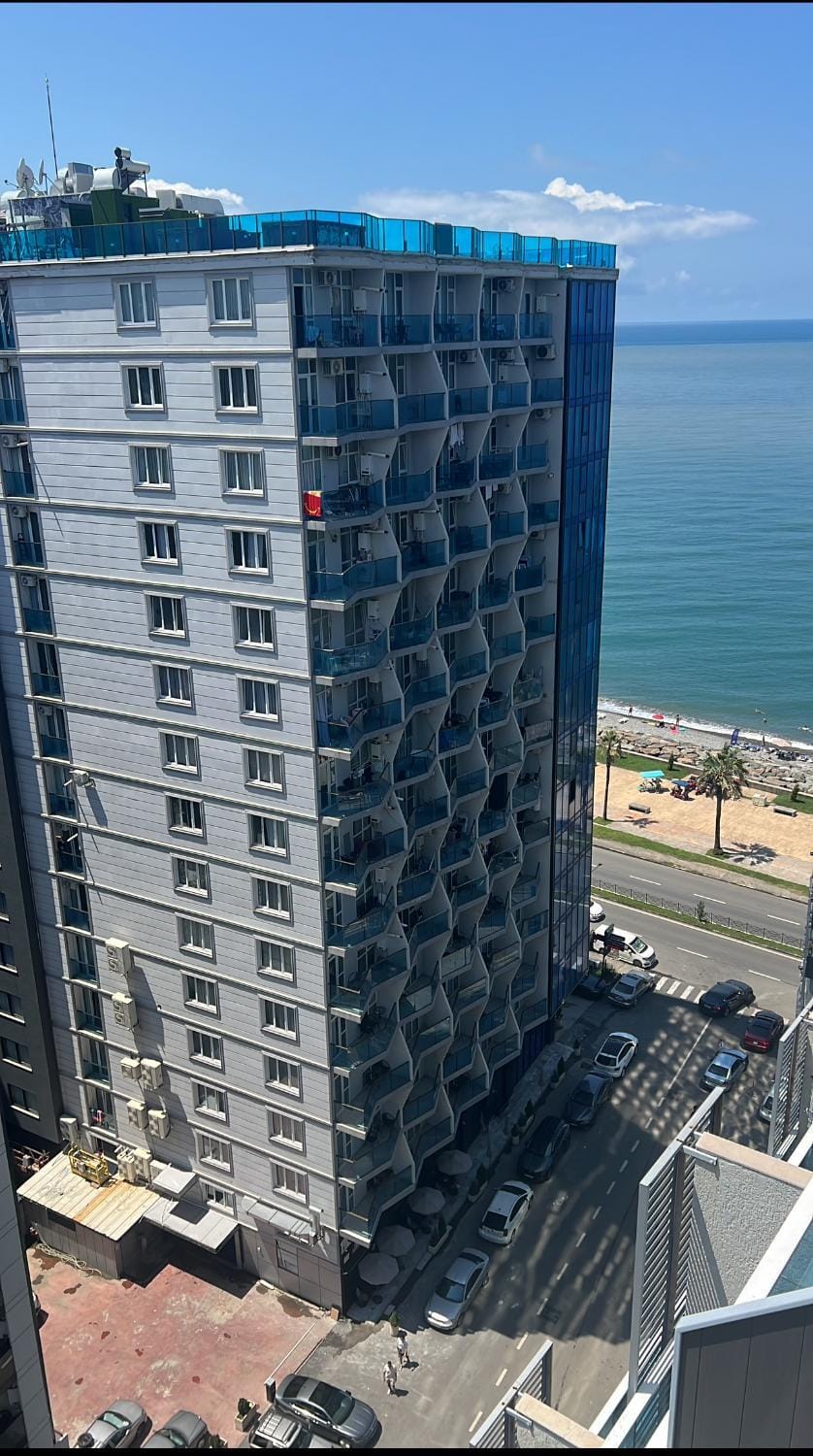 Property building, Day, Natural landscape, City view, Sea view, Location, Parking