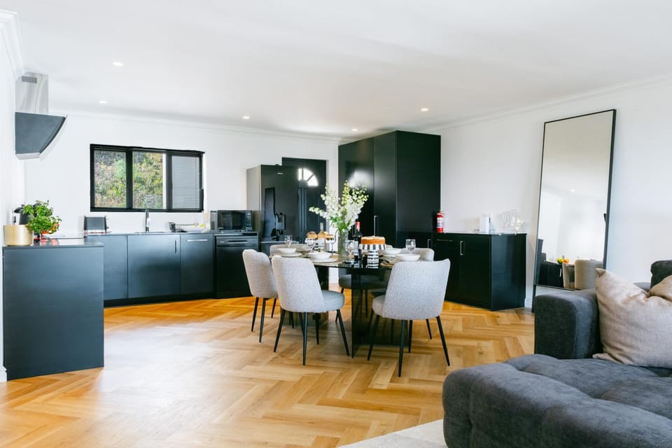 Dining area, dishwasher, hair dryier, oven, stove, washing machine, dryer, kitchen