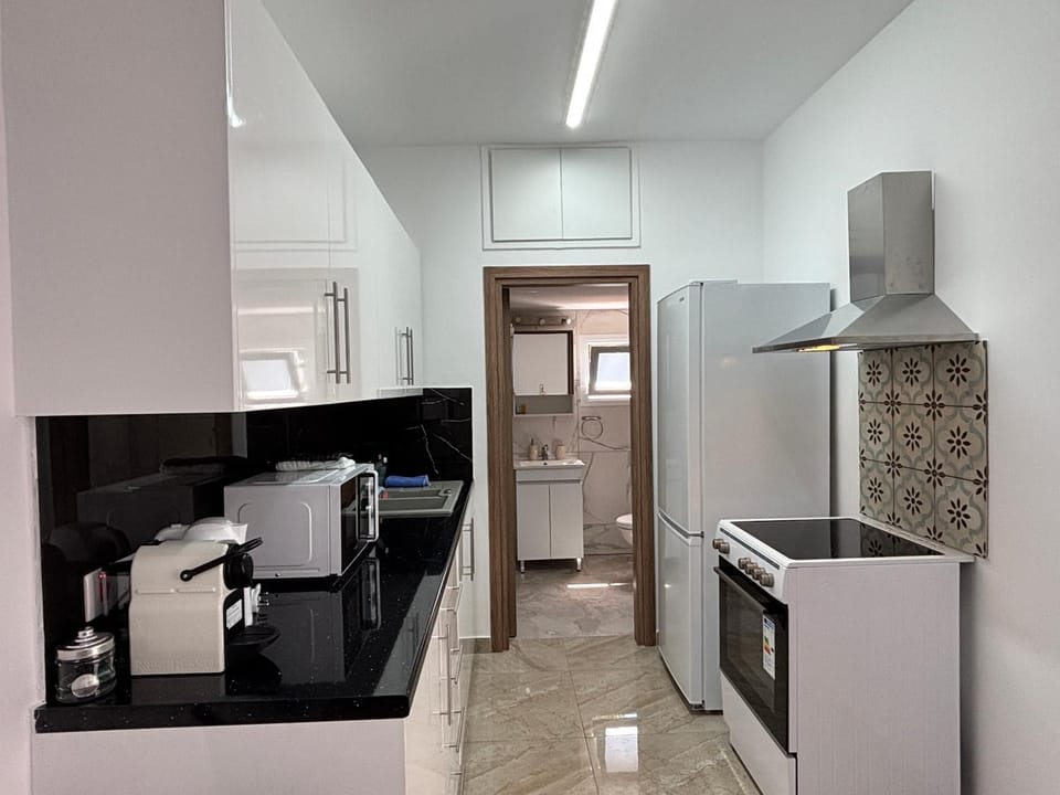 Kitchen or kitchenette, oven, stove, toaster