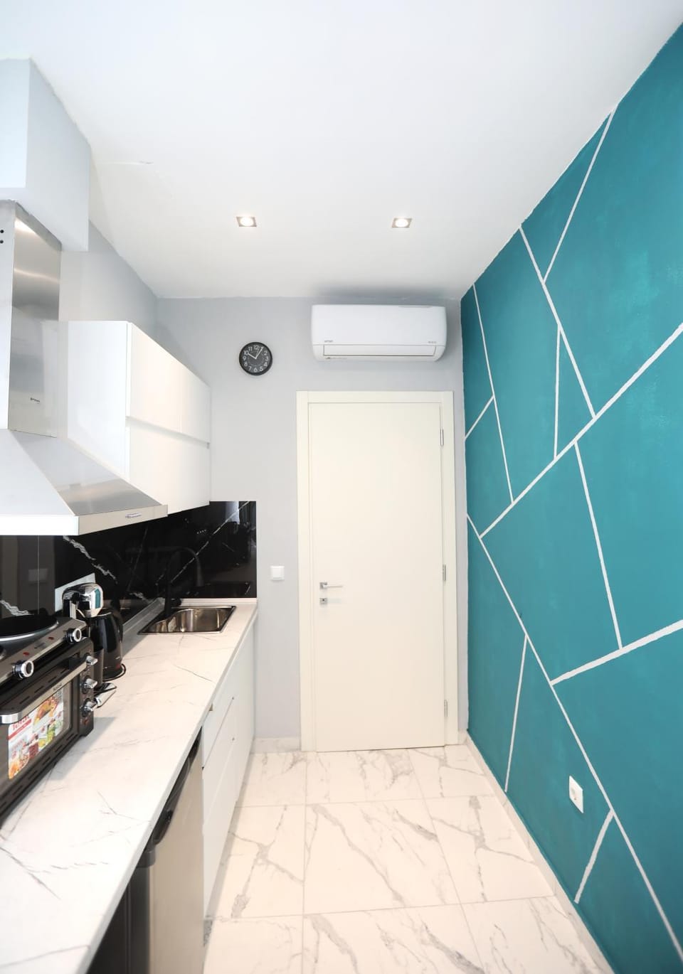 Kitchen or kitchenette, oven, air conditioner